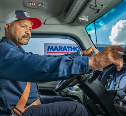 A MPC truck driver adjusting his GPS.